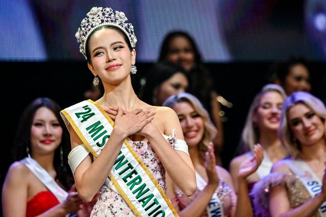 La beauté et la porte de la promotion de la culture vietnamienne