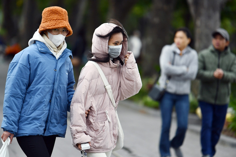 The North has light rain and cold air before a strong cold front arrives.