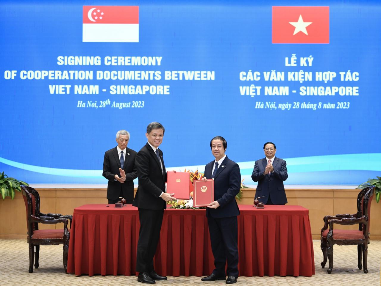 - Vietnam side: Minister of Education and Training Nguyen Kim Son. - Singapore side: Minister of Education Chan Chun Sing.