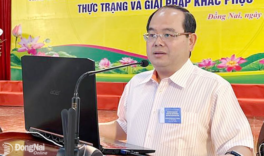 Deputy Secretary of the Provincial Party Committee, Head of the National Assembly Delegation of Quan Minh Cuong province speaking at the workshop