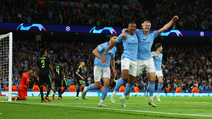 Các cầu thủ Man City mừng bàn trong trận thắng Real 4-0 ở bán kết lượt về mùa 2022-2023. Ảnh: Reuters