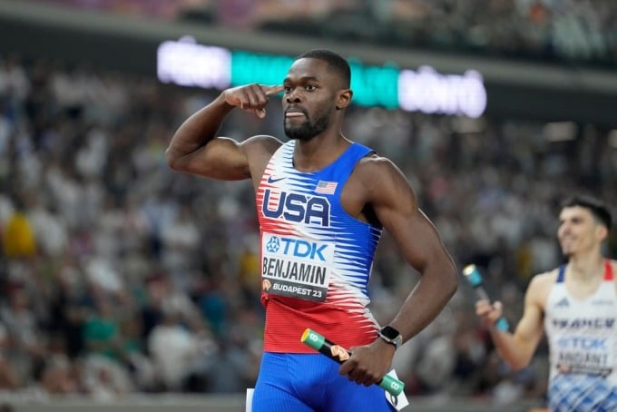 Benjamin celebrates after completing the final run, helping the US win the men's 4x400m at Budapest 2023. Photo: AP