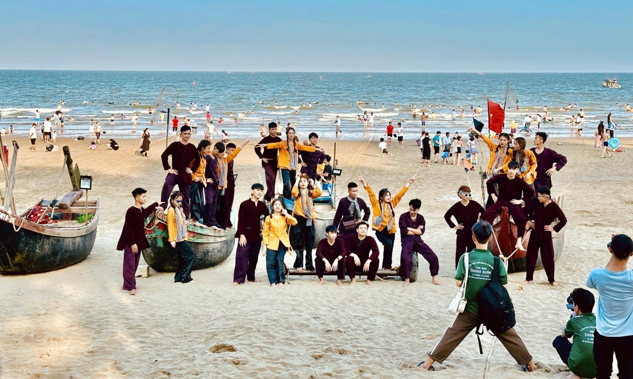 Bustling posing next to the fishing village in the middle of Sam Son beach city photo 10