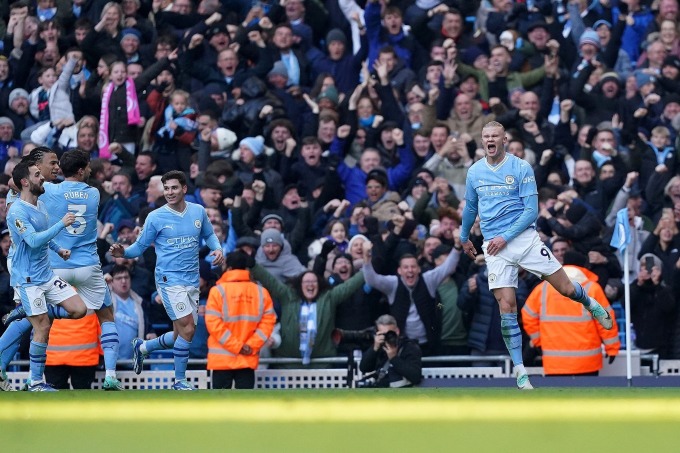 Haaland (No. 9) celebrates the opening goal against Liverpool. Photo: Reuters