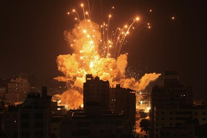 A rocket explodes during an Israeli airstrike on the Gaza Strip on October 8, 2023. (Photo: AFP)