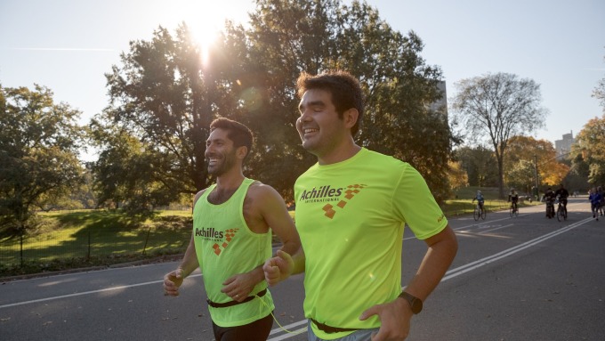 Schulman (left) walks alongside Magisano during a training session in Manhattan's Central Park, preparing for the final major race of the year, the New York City Marathon. Photo: NYT