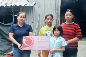 Quang Tri Newspaper's authors cite national journalism award to support 4 orphaned sisters