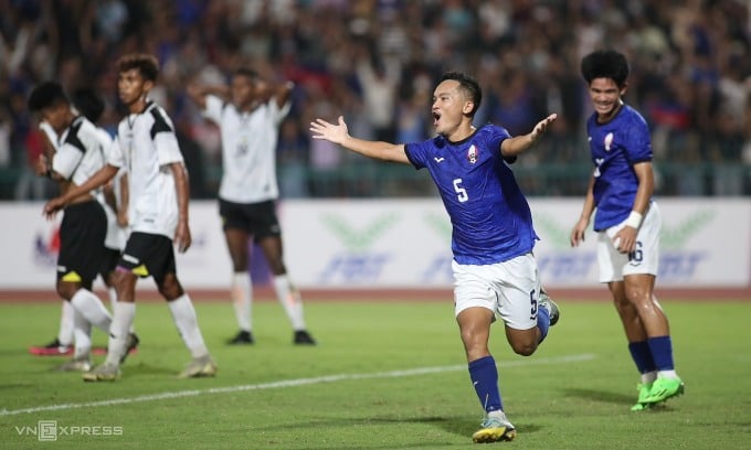 Chou Sinti (No. 5) celebrates after scoring a double for U22 Cambodia. Photo: Lam Thoa