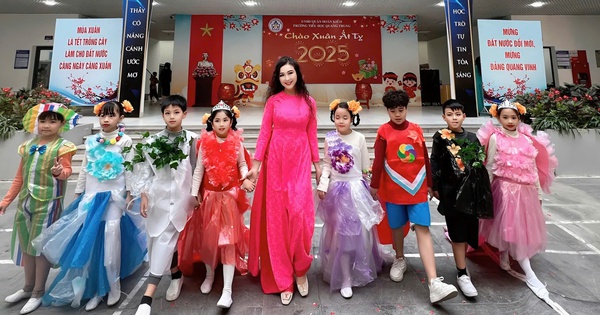 Teachers and students confidently perform recycled fashion