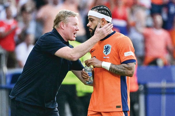 Koeman từng cho biết không hài lòng trước phong độ của Depay tại EURO 2024 nhưng ông vẫn đặt niềm tin vào cậu học trò. Ảnh: AFP