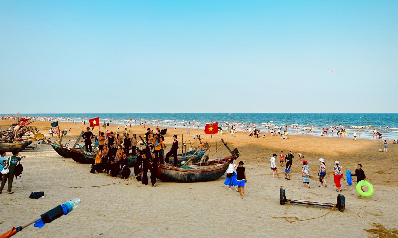 Bustling posing next to the fishing village in the middle of Sam Son beach city photo 8