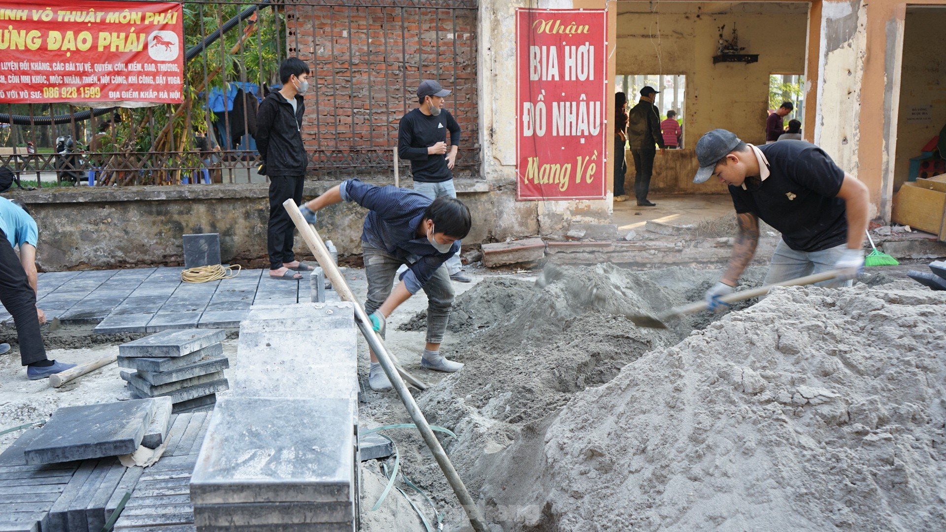 Sidewalks not yet dry mortar has been 'chopped up' by cars and motorbikes photo 1