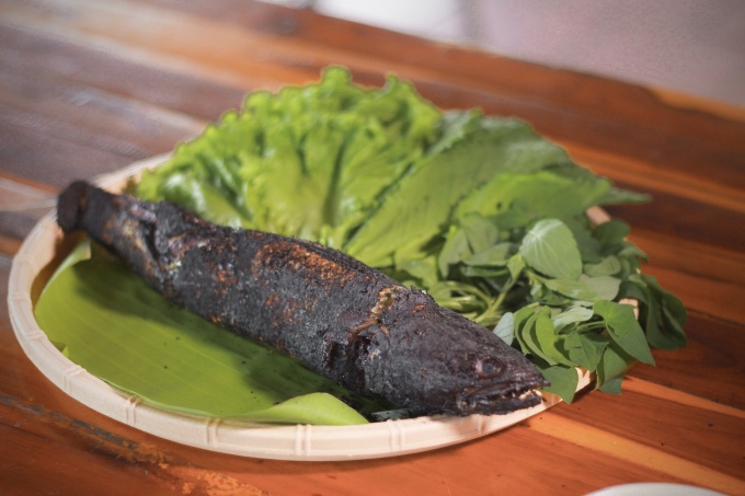 Grilled snakehead fish is a rustic specialty of the U Minh Ha region.