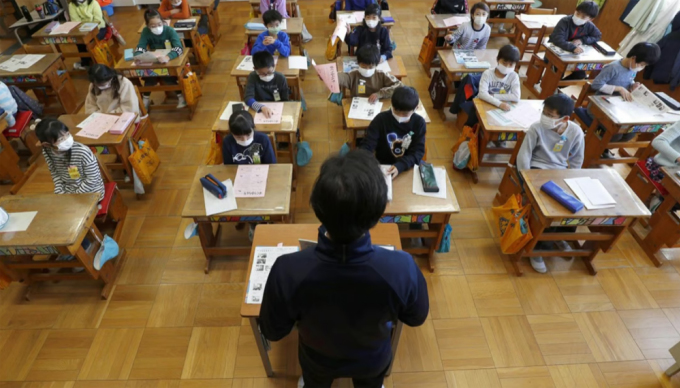 Japan's Ministry of Education found that teachers worked an average of 95 hours and 32 minutes of overtime per month, exceeding the health standards set by the country's Ministry of Health. Photo: Kyodo