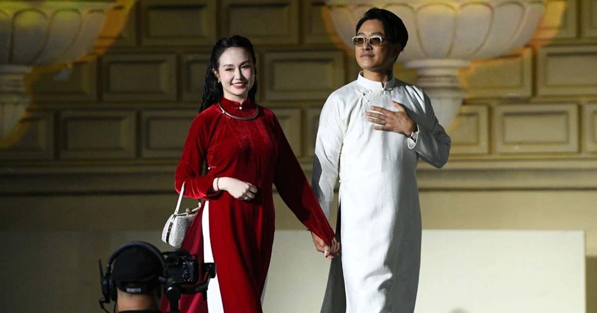 Tuan Hung កាន់ដៃភរិយា Huong Baby ក្នុងកម្មវិធីបង្ហាញម៉ូដ