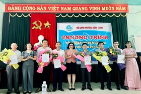 The first 6 men in Quang Tri became honorary members of the Vietnam Women's Union