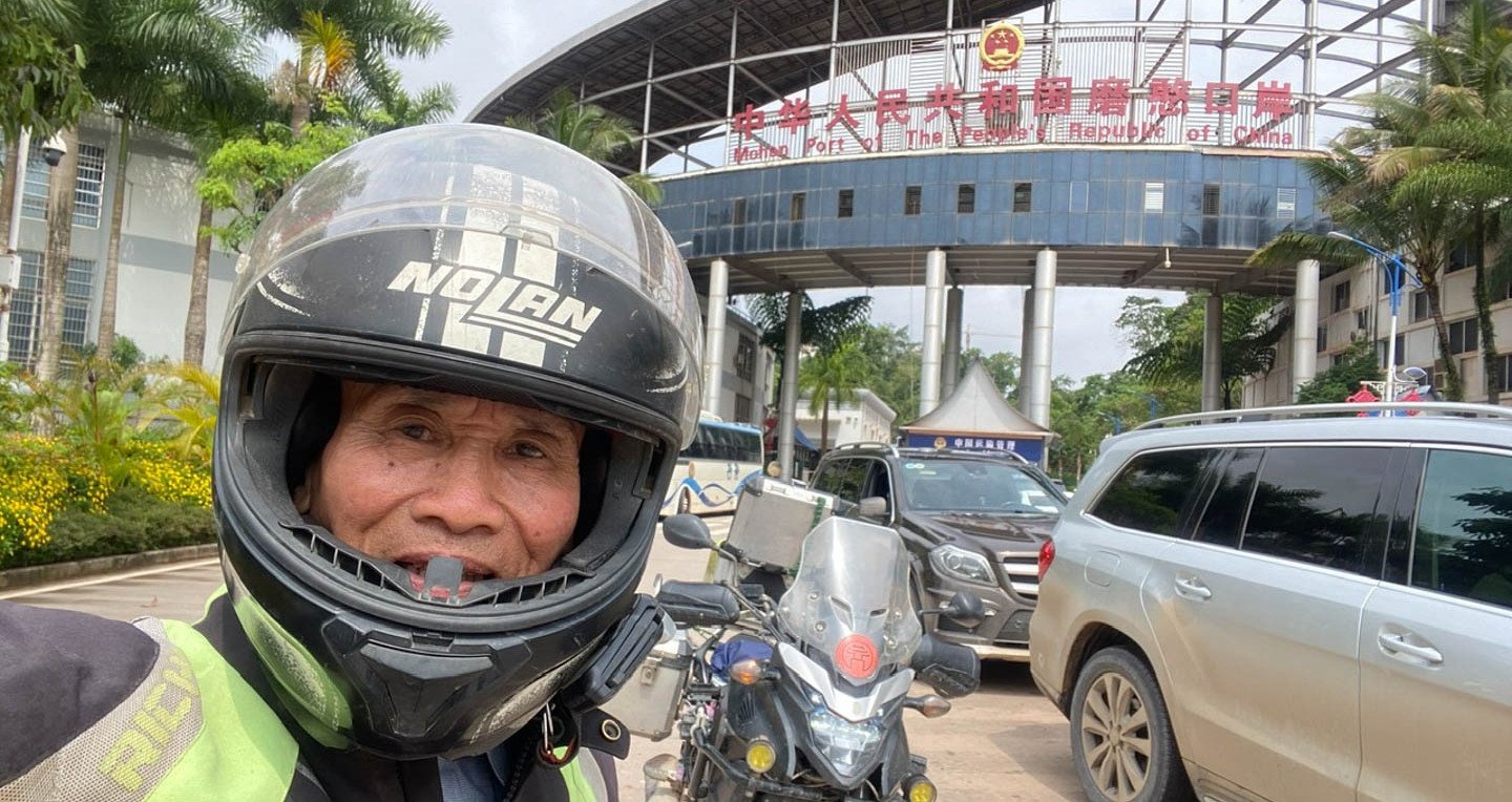 After a secret trip to Tibet, what did the 71-year-old backpacker do as soon as he returned to Hanoi?