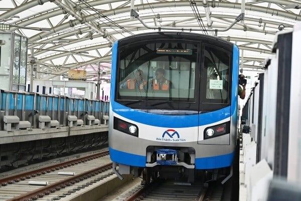 Ben Thanh - Suoi Tien metro train runs through Tet