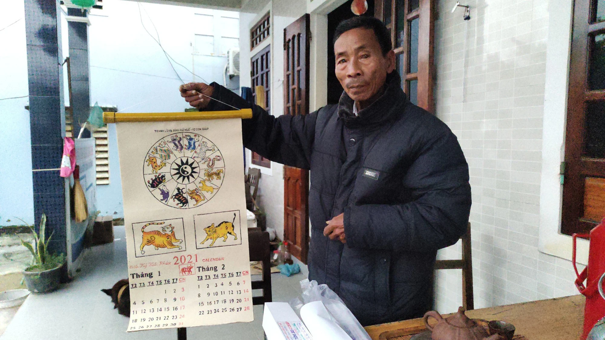 Người nay làm việc xưa: 500 năm níu giữ tranh mộc bản làng Sình - Ảnh 2.
