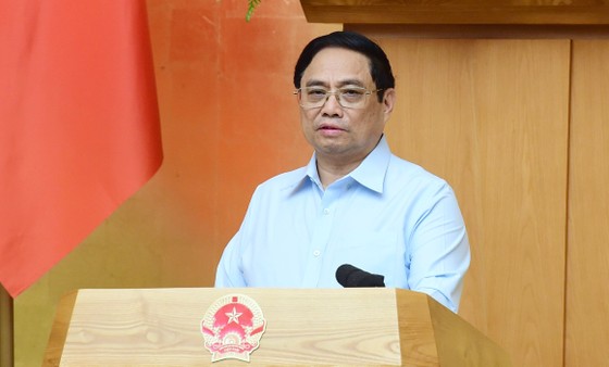 Prime Minister requests strict handling of cases of illegal profiteering, pushing up rice prices photo 1