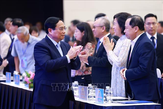 Le Premier ministre participe à une conférence des Vietnamiens vivant à l'étranger