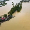 Die Straße zum Dorf Nhan Ly (Gemeinde Nam Phuong Tien, Bezirk Chuong My, Hanoi) steht unter Wasser. Foto: Hoai Nam-VNA