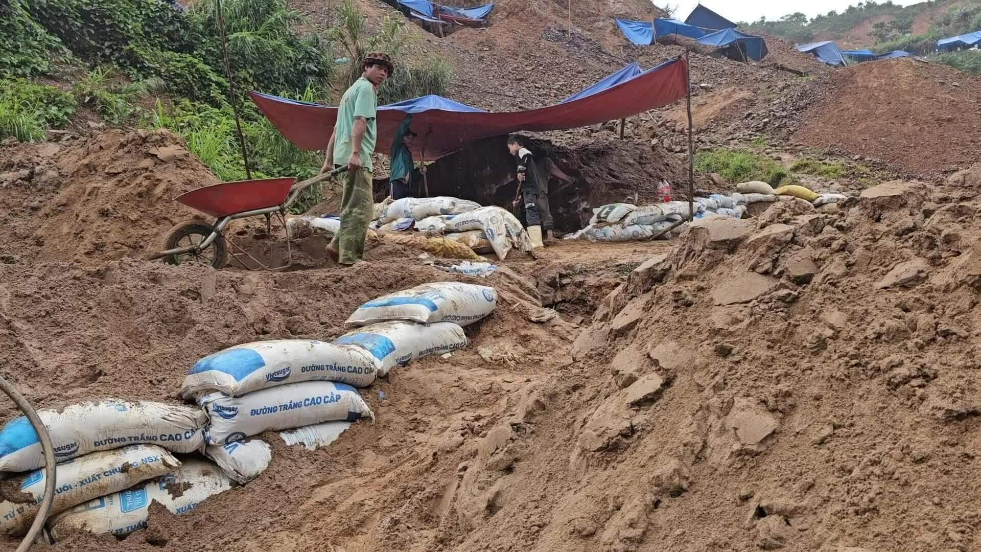 Auge de la extracción de oro cerca del Tet