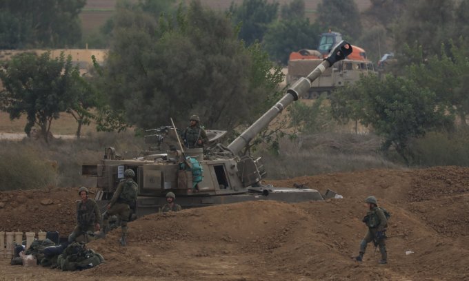 Israeli self-propelled artillery deployed near the Gaza Strip border on October 10. Photo: AFP