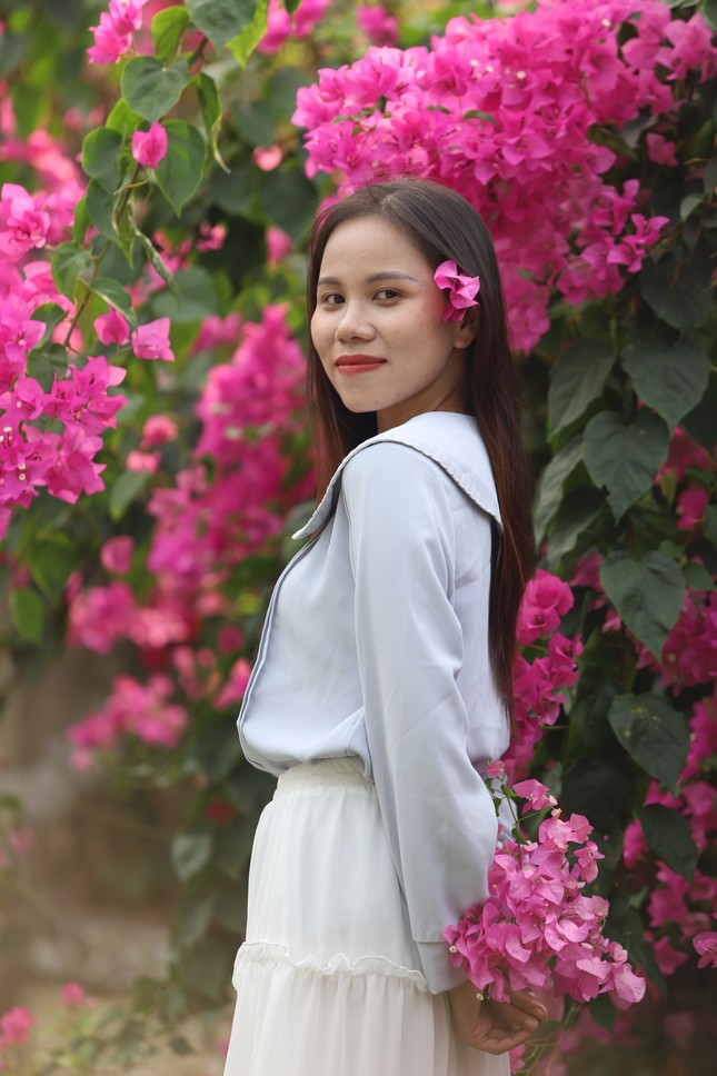 The stunningly beautiful bougainvillea path leading to Ho Chi Minh City National University photo 8