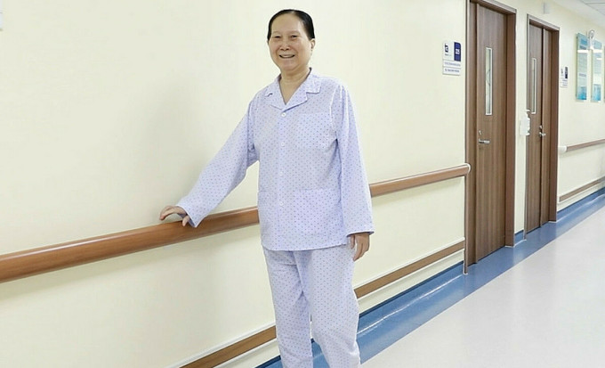 Ms. Lien walks by herself two days after hip replacement surgery. Photo: Tam Anh General Hospital