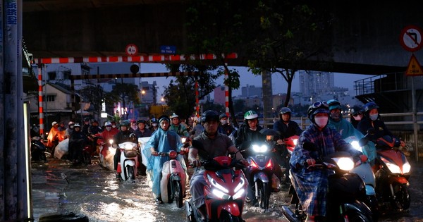 Traffic jams and flooded roads in Ho Chi Minh City after unseasonal rain combined with high tide on the full moon day of December