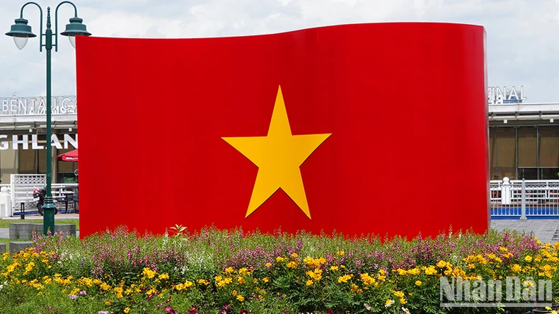 Ho Chi Minh City: Streets are filled with flags and flowers to celebrate National Day September 2