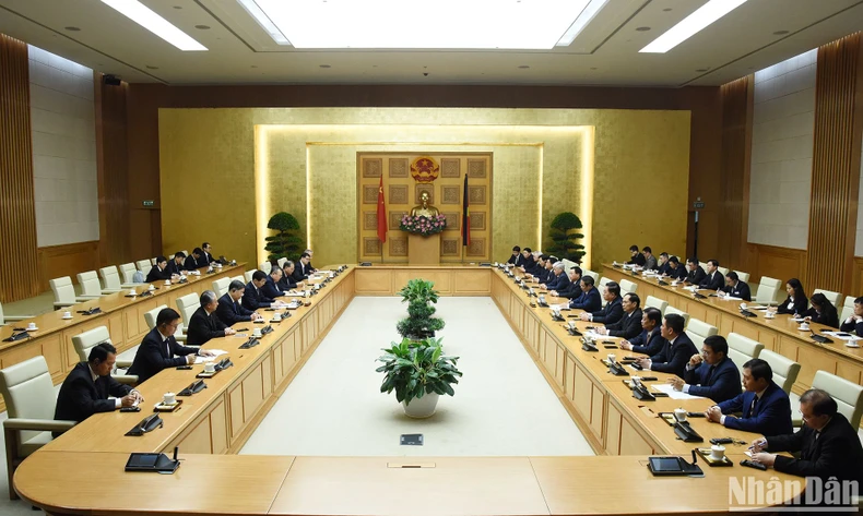 [Photo] Prime Minister Pham Minh Chinh receives Chairman of the Chinese People's Political Consultative Conference Wang Huning photo 6