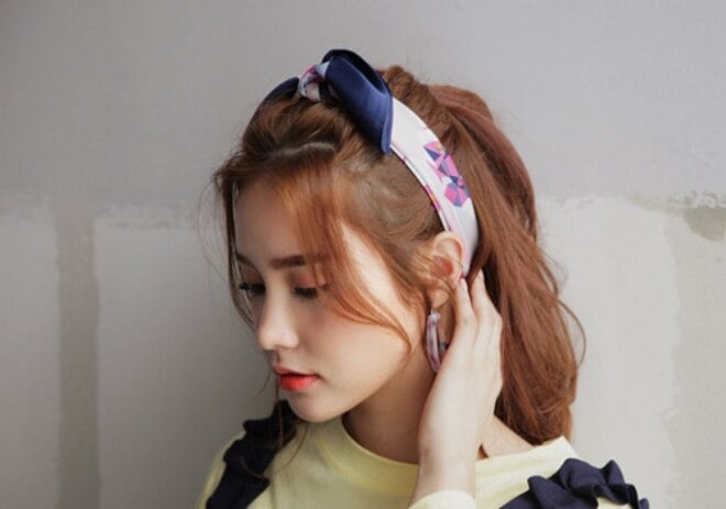 Trendy Kurzhaarfrisuren helfen Ihnen, Ihre Persönlichkeit mit Ao Dai zu zeigen – 7