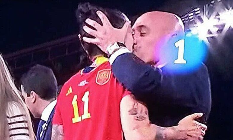 President of Spanish Football Federation criticized for kissing female player