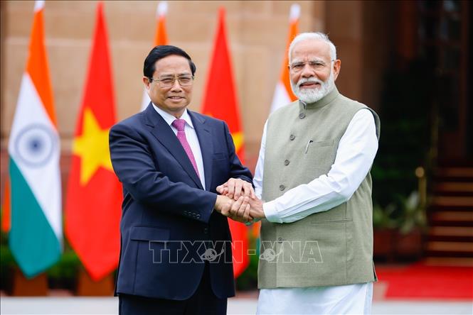 Prime Minister Pham Minh Chinh meets with Indian Prime Minister Narendra Modi