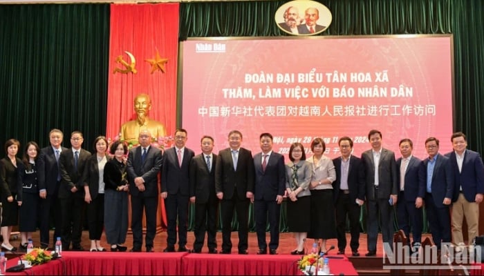 Báo Nhân Dân và Tân Hoa Xã đẩy giao lưu, hợp tác