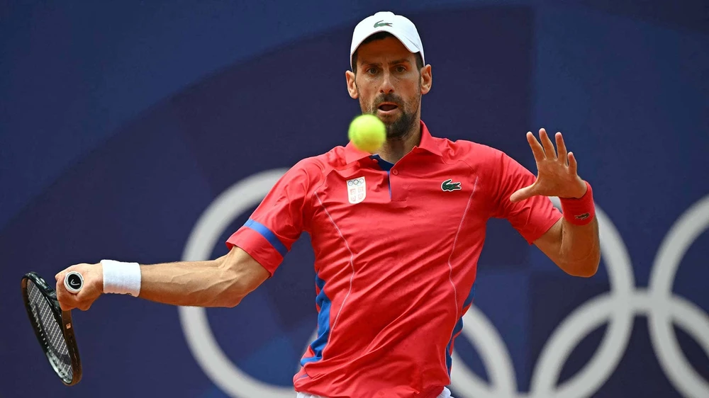 Djokovic reaches quarterfinals