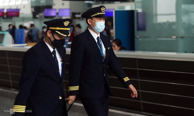 Piloten von Vietnam Airlines am Flughafen Noi Bai (Hanoi). Foto: Gia Chinh