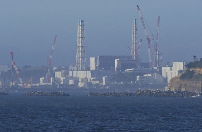 8月24日、浪江町から見た福島原発。写真：共同通信