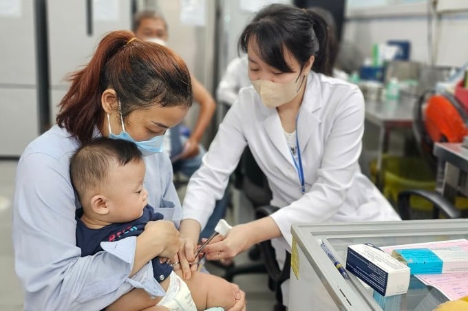 Hà Nội tiêm vaccine cho trẻ, tháng 4/2022. Ảnh:Phạm Chiểu