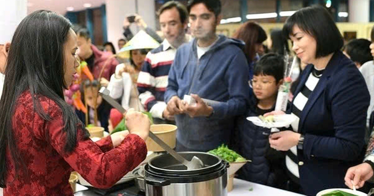 International visitors line up to enjoy Vietnamese pho