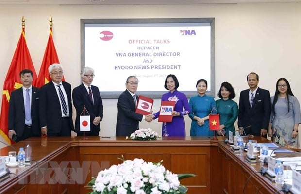 La Agencia de Noticias de Vietnam y Kyodo News firman un acuerdo de cooperación profesional