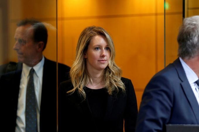 Elizabeth Holmes leaves a courtroom in San Francisco in 2019. Photo: Reuters