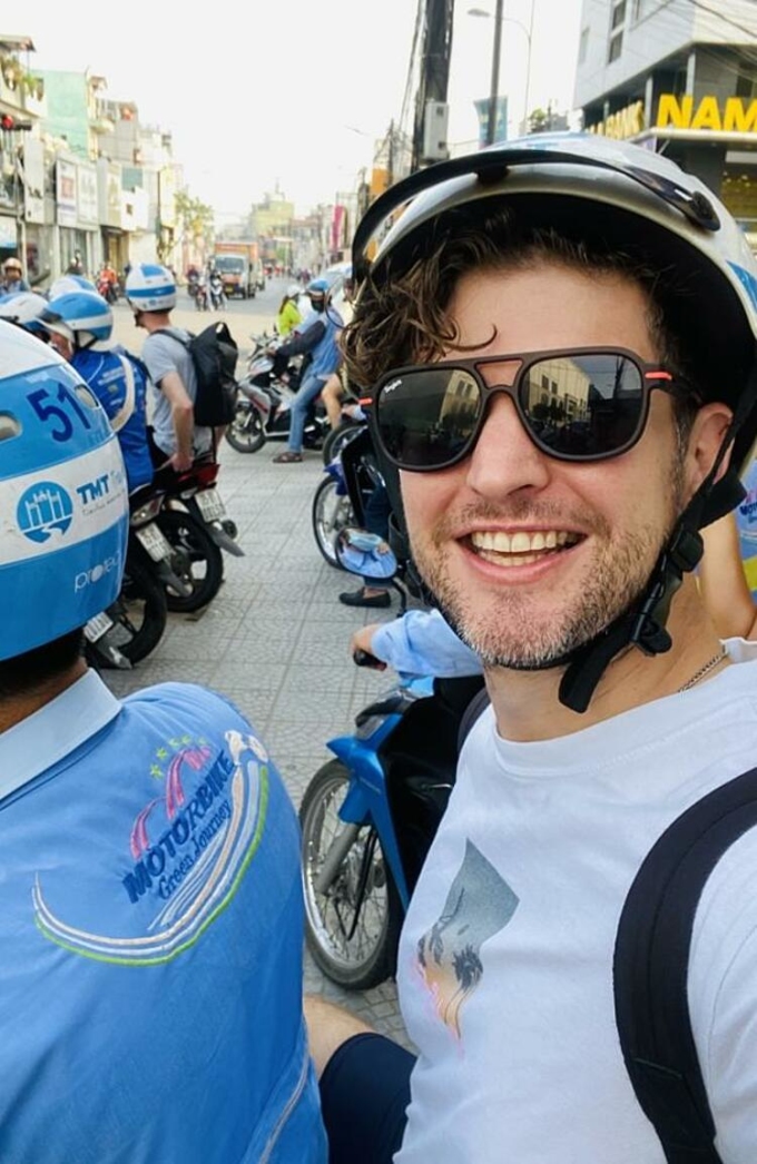 Troy rides a motorbike to explore Hue. Photo: Troy Nankervis