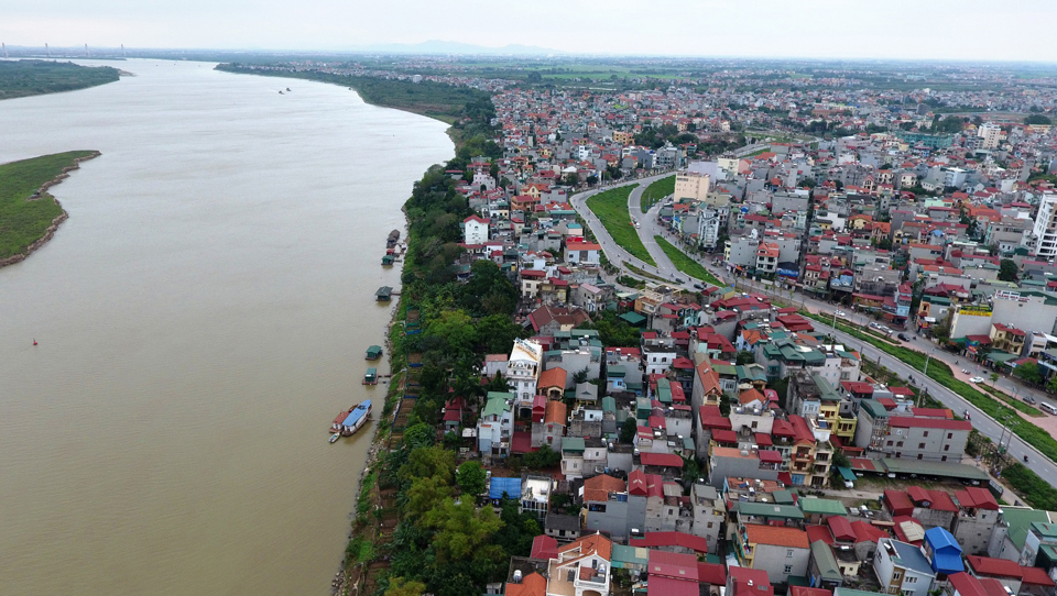 Cần có cơ chế, chính sách để tháo gỡ vướng mắc cho người dân nằm trong vùng quy hoạch sông Hồng. Ảnh: Hải Linh