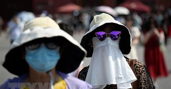 China issues yellow alert for heat and heavy rain