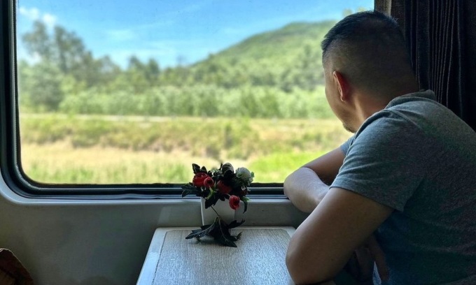 統一列車に乗った観光客ウィンストン・シアウ。