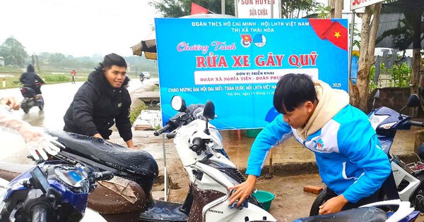 Young people wash cars to raise funds for charity