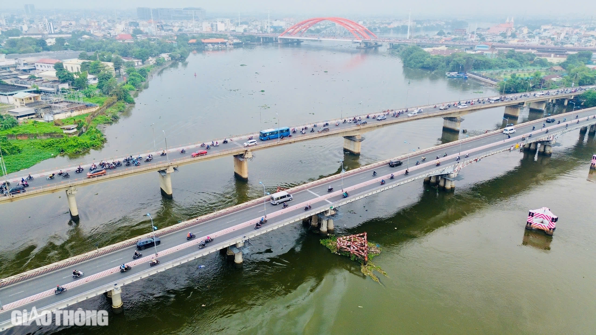 TP.HCM: Bắt đầu nâng tĩnh không cầu Bình Triệu 1 và Bình Phước 1 lên mức 7m- Ảnh 2.